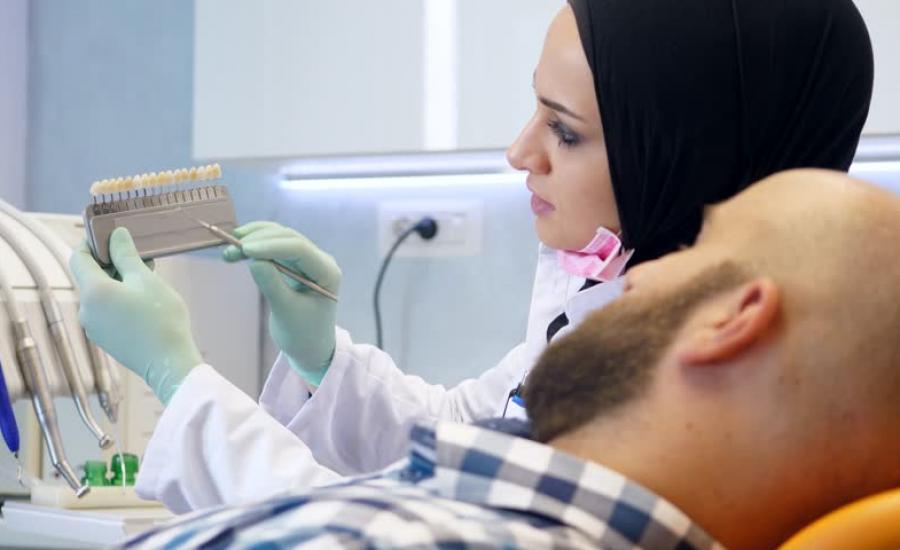 تعويض طبيبة أسنان فلسطينية 
