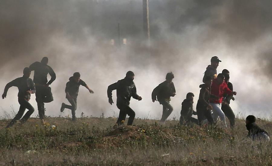 اصابة فلسطينيين بغزة 
