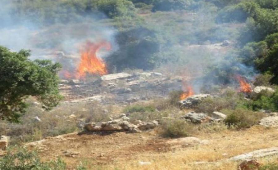 المستوطنون يحرقون اراضي المواطنين في رام الله 