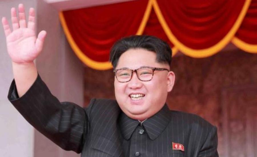 97531183_North_Korean_leader_Kim_Jong_Un_waves_from_Kim_Il_Sung_Square_before_the_start_of_a_mass_ra-large_trans++KkzUGe8q7_A35DWV6BPUcaXdHsmKH8yTHSUA0EWNyyI