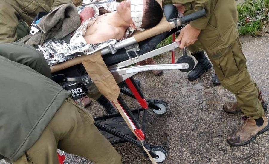 اعتقال شاب بعد اصابتة في غزة 