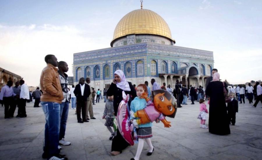 Thousands-of-Muslim-worshippers-arrive-to-Eid-prayers-at-the-al-Aqsa-Mosque-in-Jerusalem-on-the-first-day-of-the-muslim-holiday-of-Eid-al-Adha-618x412
