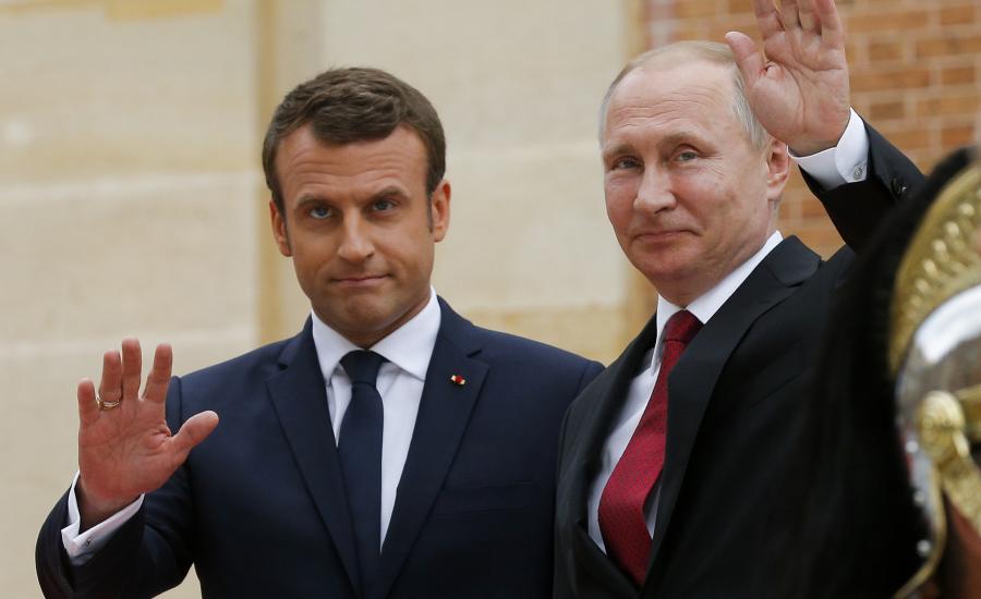بوتين والرئيس الفرنسي 