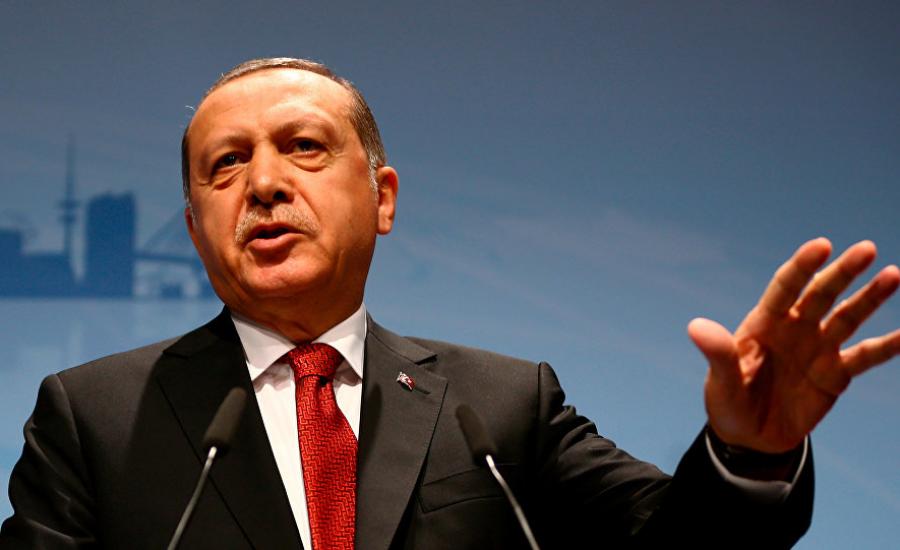 أردوغان يطالب أمريكا بتفسير لرفع صورة زعيم حزب العمال الكردستاني في الرقة