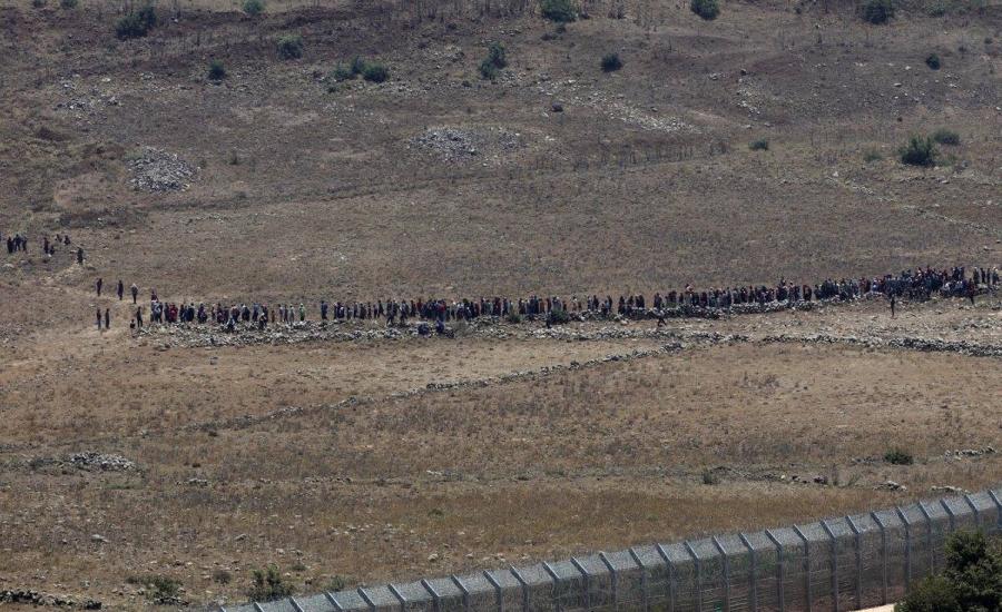 النازحيين السورييين على الحدود مع اسرائيل 