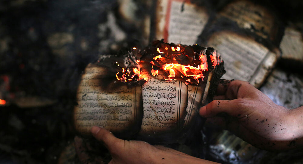 متطرفون في السويد يحرقون القرآن الكريم تضامنا مع قطع رأس المدرس في فرنسا |  رام الله
